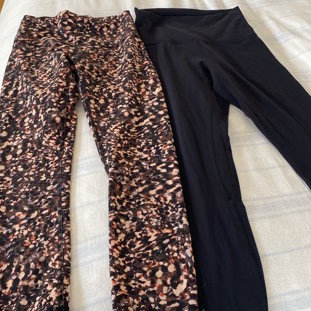 Bundle of two lululemon black leggings and multi color crop leggings size 4